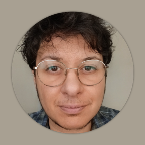 Profile picture of Nassos, a man with dark hair wearing glasses